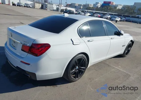 2015 BMW 740I из США, поврежденный, VIN WBAYA6C59FGK16663
